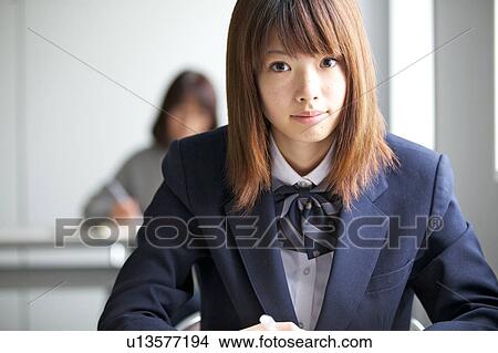 Picture - High school girl looking at camera. Fotosearch