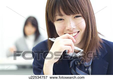 High school girl looking at camera View Large Photo Image Stock Photo - High school girl looking at camera. Fotosearch