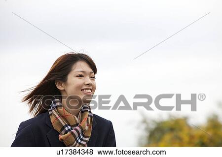 Stock Photo - High school girl smiling. Fotosearch