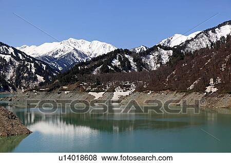 Stock Photo - Kurobe lake and Tateyama mountain range, Toyama Prefecture, Honshu, Japan. Fotosearch