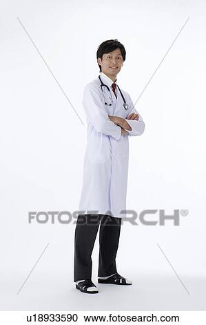 Male Doctor Standing with Arms Crossed View Large Photo Image Stock Image - Male Doctor Standing with Arms Crossed. Fotosearch