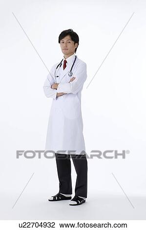 Male Doctor Standing with Arms Crossed View Large Photo Image Stock Image - Male Doctor Standing with Arms Crossed. Fotosearch