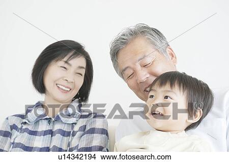 Picture - Mature Couple with Grandson. Fotosearch