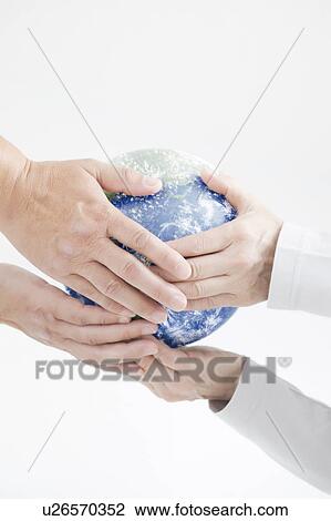 Mature man and woman holding globe View Large Photo Image Stock Image - Mature man and woman holding globe. Fotosearch