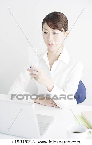 Mid Adult Businessman Text Messaging View Large Photo Image Stock Image - Mid Adult Businessman Text Messaging. Fotosearch