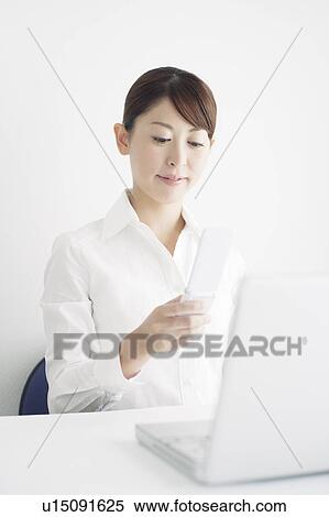 Mid Adult Businessman Text Messaging View Large Photo Image Stock Photography - Mid Adult Businessman Text Messaging. Fotosearch