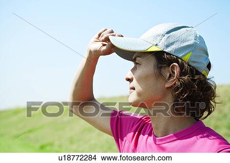 Picture - Mid Adult Man Jogging. Fotosearch