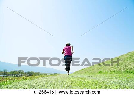 Mid Adult Man Jogging View Large Photo Image Stock Image - Mid Adult Man Jogging. Fotosearch