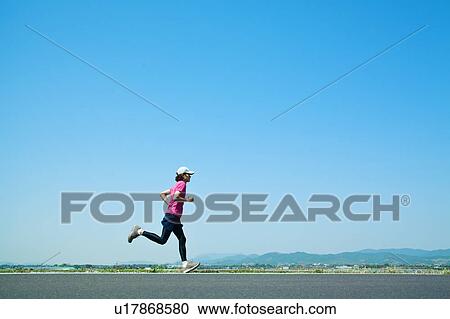 Mid Adult Man Jogging View Large Photo Image Stock Image - Mid Adult Man Jogging. Fotosearch