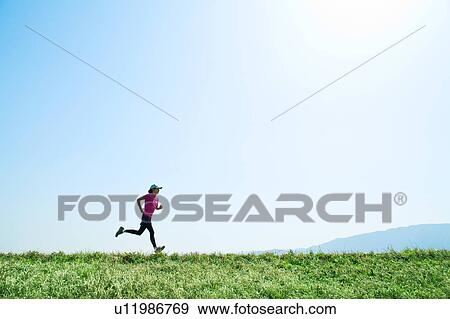 Mid Adult Man Jogging View Large Photo Image Stock Photo - Mid Adult Man Jogging. Fotosearch