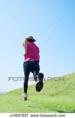 Mid Adult Man Jogging View Large Photo Image Stock Photo - Mid Adult Man Jogging. Fotosearch