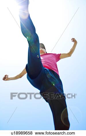 Mid Adult Man Jumping View Large Photo Image Stock Photo - Mid Adult Man Jumping. Fotosearch