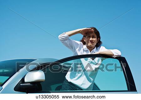Mid Adult Man Leaning Against Car Door View Large Photo Image Stock Photography - Mid Adult Man Leaning Against Car Door. Fotosearch