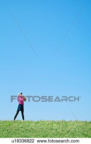 Mid Adult Man Stretching Under Blue Sky View Large Photo Image Stock Image - Mid Adult Man Stretching Under Blue Sky. Fotosearch