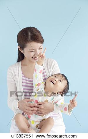 Stock Image - Mother and Baby Boy. Fotosearch