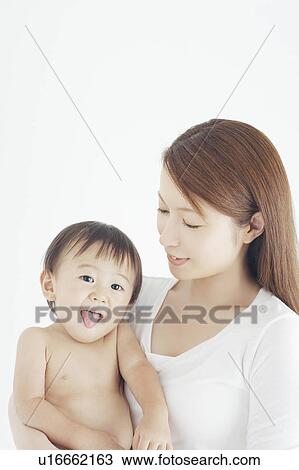 Stock Image - Mother and Baby Boy. Fotosearch
