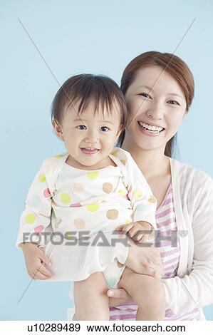 Stock Photo - Mother and Baby Boy. Fotosearch