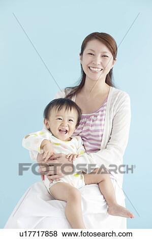Stock Photo - Mother and Baby Boy. Fotosearch