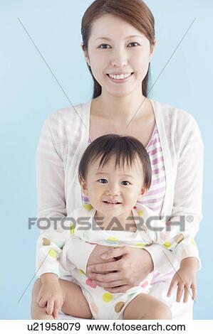 Stock Photo - Mother and Baby Boy. Fotosearch