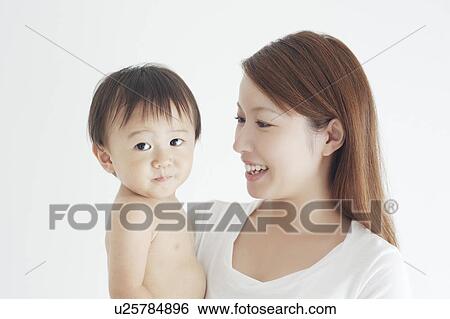 Stock Photograph - Mother and Baby Boy. Fotosearch