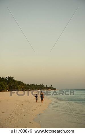 Mother and Son Walking on Beach View Large Photo Image Stock Photograph - Mother and Son Walking on Beach. Fotosearch