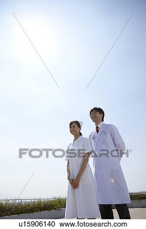 Stock Image - Nurse and Doctor. Fotosearch