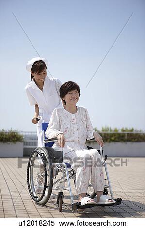 Nurse and Female Patient View Large Photo Image Stock Photography - Nurse and Female Patient. Fotosearch