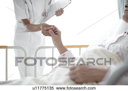 Nurse Holding Patient's Hand View Large Photo Image Stock Photography - Nurse Holding Patient's Hand. Fotosearch