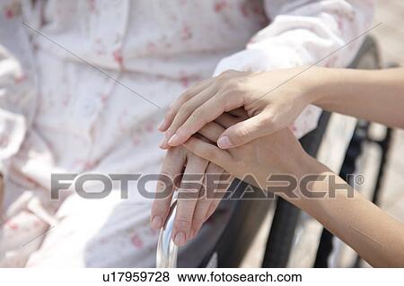 Nurse Touching Patient's Hands View Large Photo Image Stock Photo - Nurse Touching Patient's Hands. Fotosearch