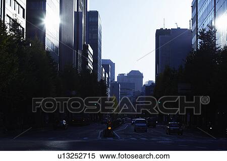 Office buildings at dawn, Chiyoda Ward, Tokyo Prefecture, Honshu, Japan View Large Photo Image Stock Photography - Office buildings at dawn, Chiyoda Ward, Tokyo Prefecture, Honshu, Japan. Fotosearch