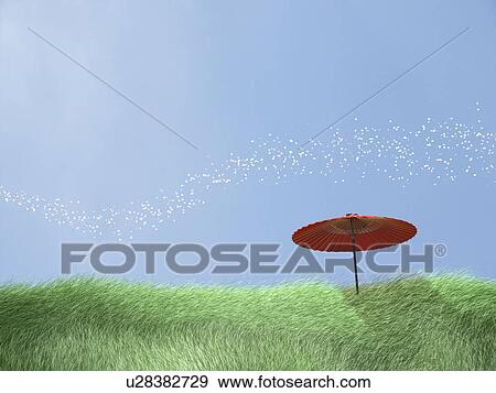 Paper umbrella in a field View Large Photo Image Stock Photo - Paper umbrella in a field. Fotosearch