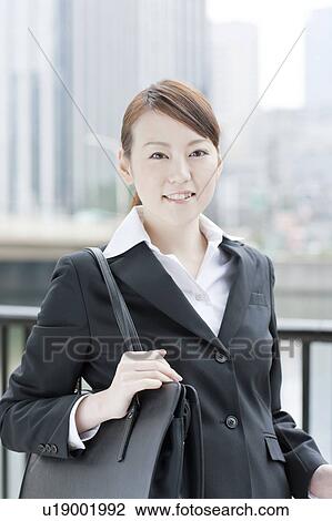 Portrait of a young businesswoman View Large Photo Image Stock Image - Portrait of a young businesswoman. Fotosearch