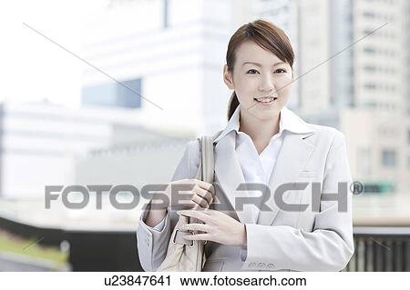 Stock Image - Portrait of a young businesswoman. Fotosearch