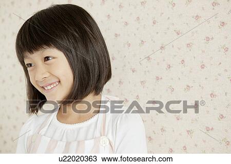 Stock Image - Portrait of Cheerful Girl. Fotosearch