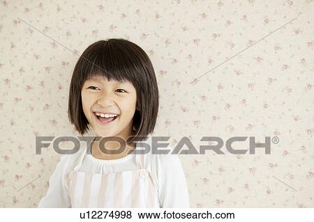 Stock Photo - Portrait of Cheerful Girl. Fotosearch