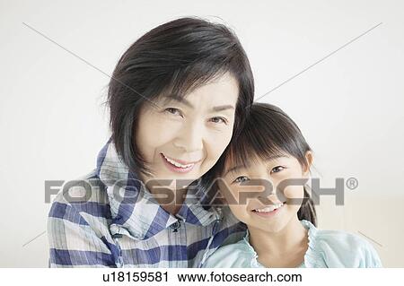 Stock Image - Portrait of Grandmother and Granddaughter. Fotosearch