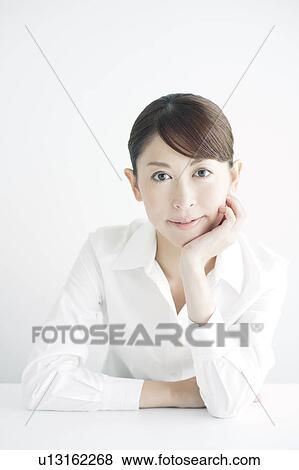 Portrait of Mid Adult Businesswoman View Large Photo Image Stock Photo - Portrait of Mid Adult Businesswoman. Fotosearch
