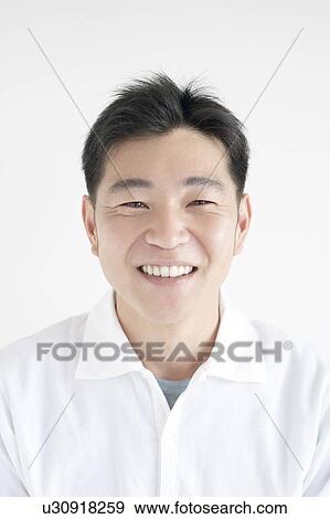 Stock Photo - Portrait of Mid Adult Man. Fotosearch