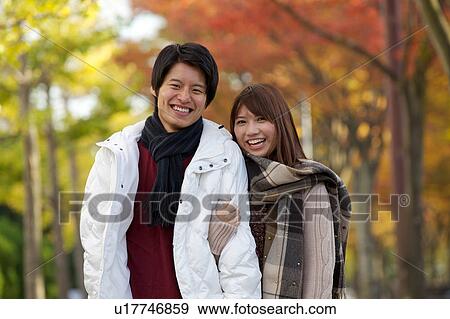 Stock Photo - Portrait of young couple . Fotosearch