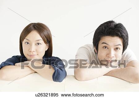 Stock Photography - Portrait of young couple. Fotosearch