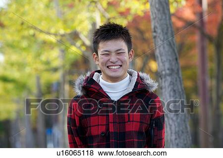 Stock Photo - Portrait of young man. Fotosearch