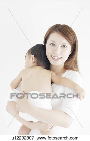 Portrait of Young Mother and Baby Boy View Large Photo Image Stock Photo - Portrait of Young Mother and Baby Boy. Fotosearch