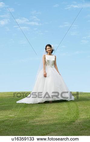 Portrait of young woman in wedding dress View Large Photo Image Stock Image - Portrait of young woman in wedding dress. Fotosearch