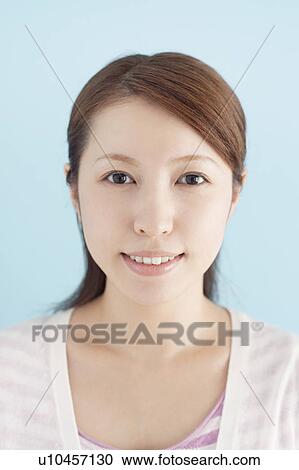 Stock Image - Portrait of Young Woman. Fotosearch