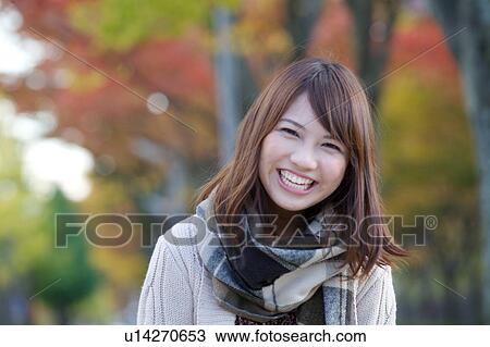 Stock Image - Portrait of young woman. Fotosearch