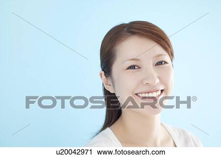 Stock Image - Portrait Of Young Woman. Fotosearch