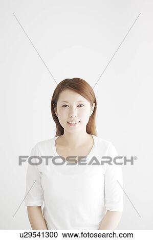 Stock Image - Portrait of Young Woman. Fotosearch