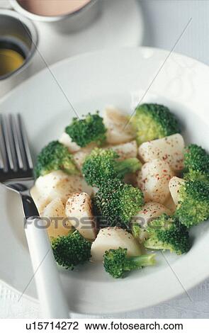Stock Image - Potato and broccoli salad. Fotosearch