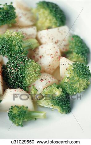Potato and broccoli salad View Large Photo Image Stock Image - Potato and broccoli salad. Fotosearch