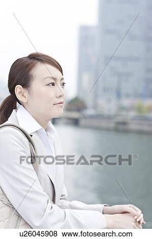 Stock Photo - Profile of young businesswoman. Fotosearch